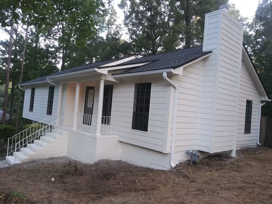 Finished white home after exterior house painting in Greater Birmingham