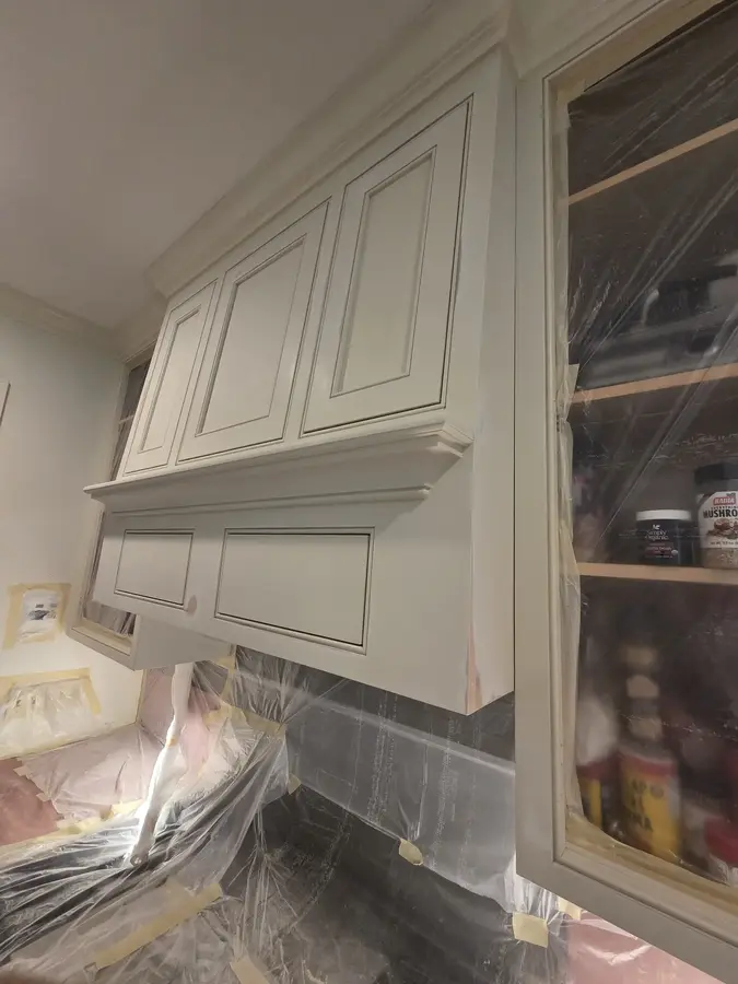 White kitchen cabinet painting project in progress