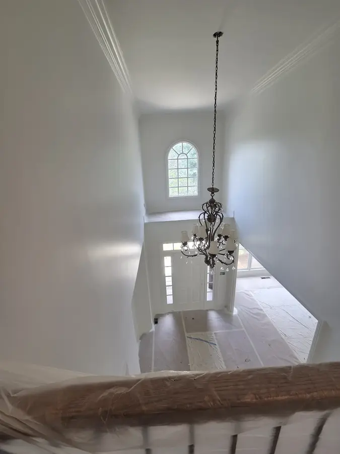 Two-story foyer after professional interior painting
